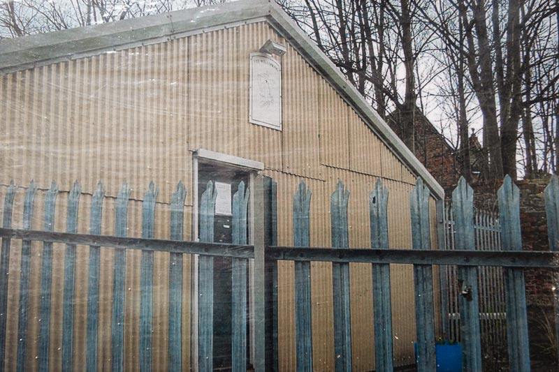 Gate and metal building